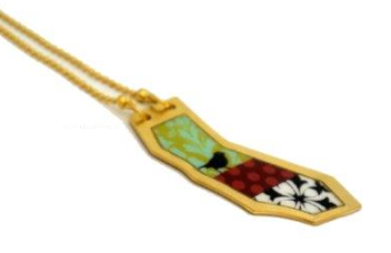 Geometric-Shaped Pendant with Green, Red and Black & White Patterns