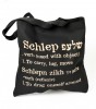 Canvas Tote Bag in White with ‘Schlep’ in English and Yiddish by Barbara Shaw